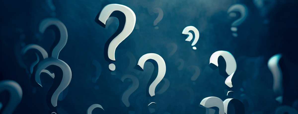 Silver question marks floating in a smokey dark blue mist